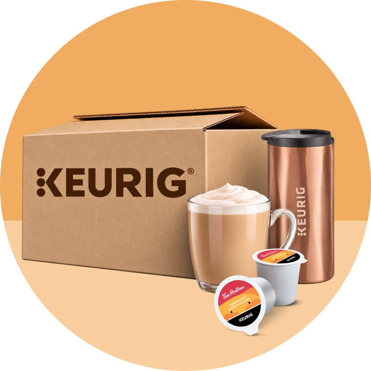 Boîte d'expédition Keurig® avec un latte, une tasse de voyage et des capsules K-Cup®
