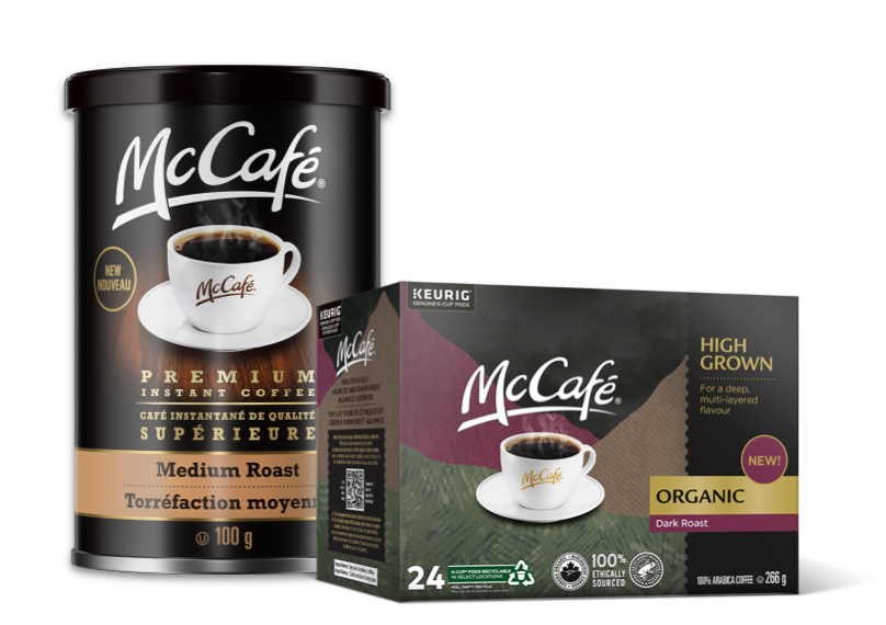 A box of high grown McCafé organic coffee and a ca of McCafé medium roast traditional coffee